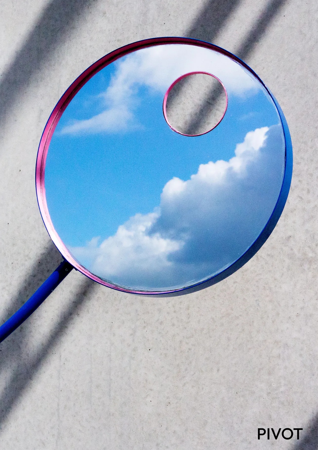 a mirror reflecting clouds. 
